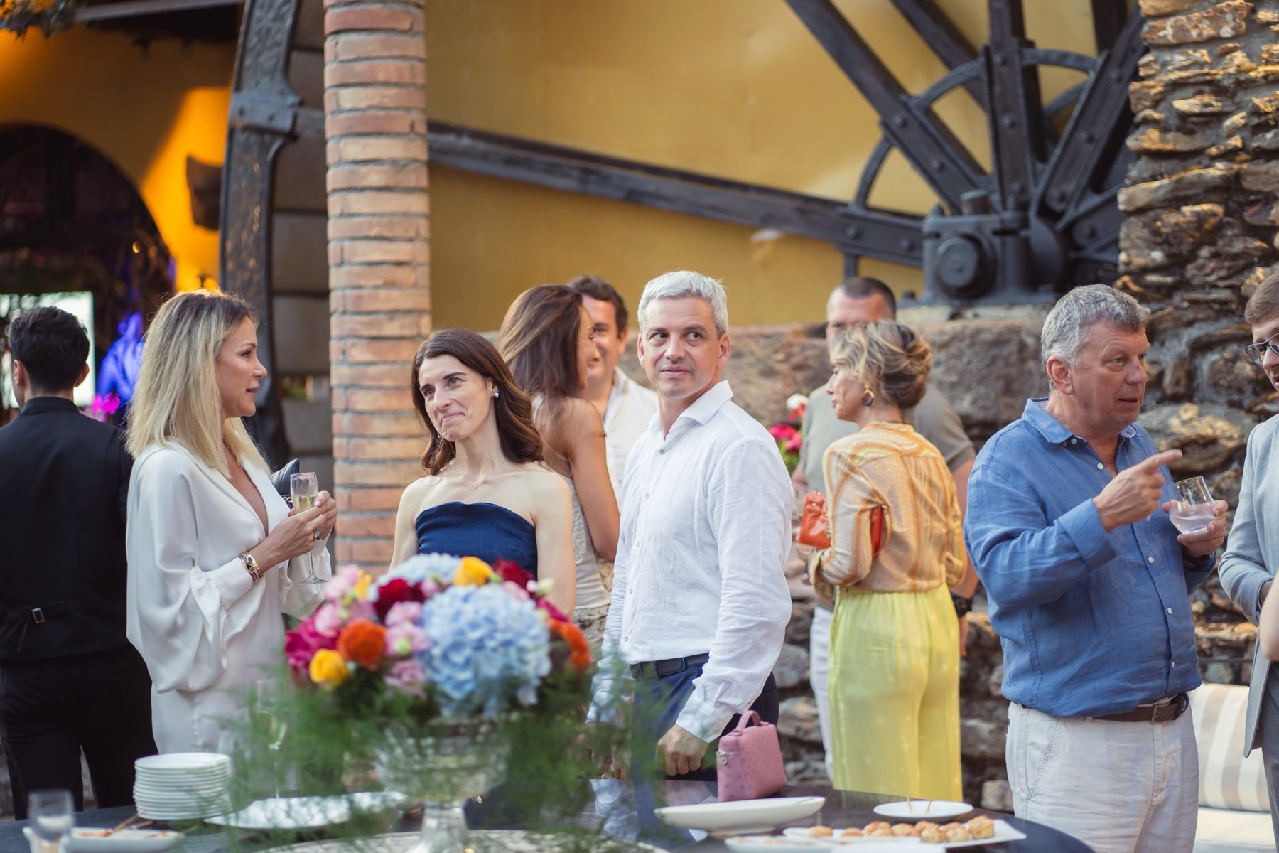 Guests at the drinks reception before the auction