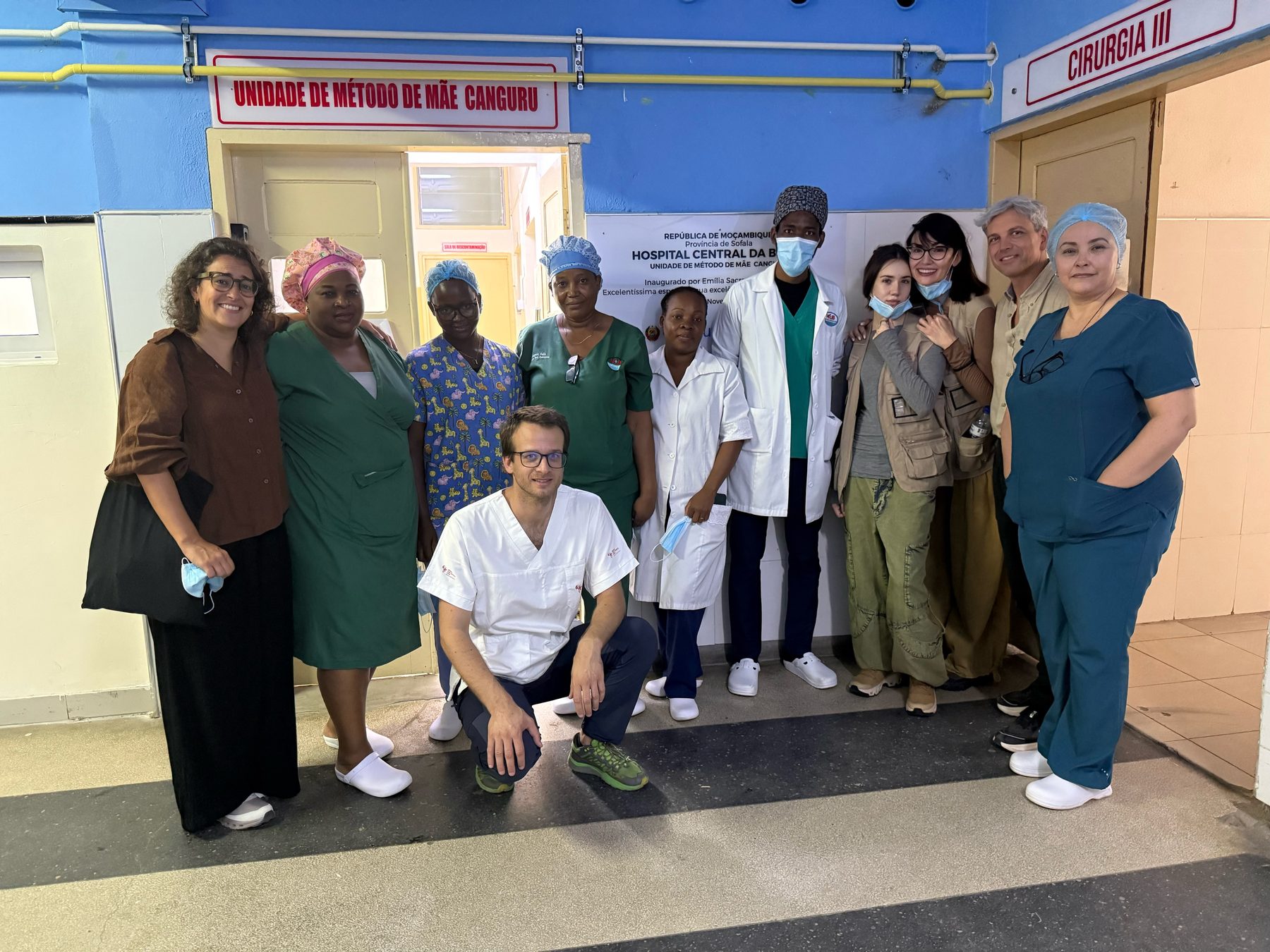 The team with partner staff and community members in Beira, Mozambique